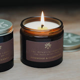 The Botanical Candle Co. Mediterranean Clementine & Rosewood natural soy candle in a reusable amber glass jar, hand-poured in England.




