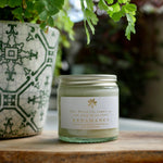 The Botanical Candle Co. Redamancy natural soy candle hand-poured in England with patchouli, rose geranium and frankincense fragrance.