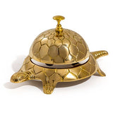 Solid brass tortoise table bell, decorative desk accessory and unique brass home décor accent for consoles, shelves and coffee tables.