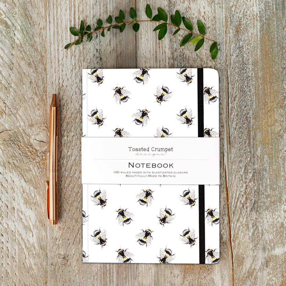 Bumblebee A5 lined notebook with elastic closure, 100 ruled pages and sustainably sourced paper, designed and made in Britain.