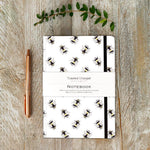 Bumblebee A5 lined notebook with elastic closure, 100 ruled pages and sustainably sourced paper, designed and made in Britain.