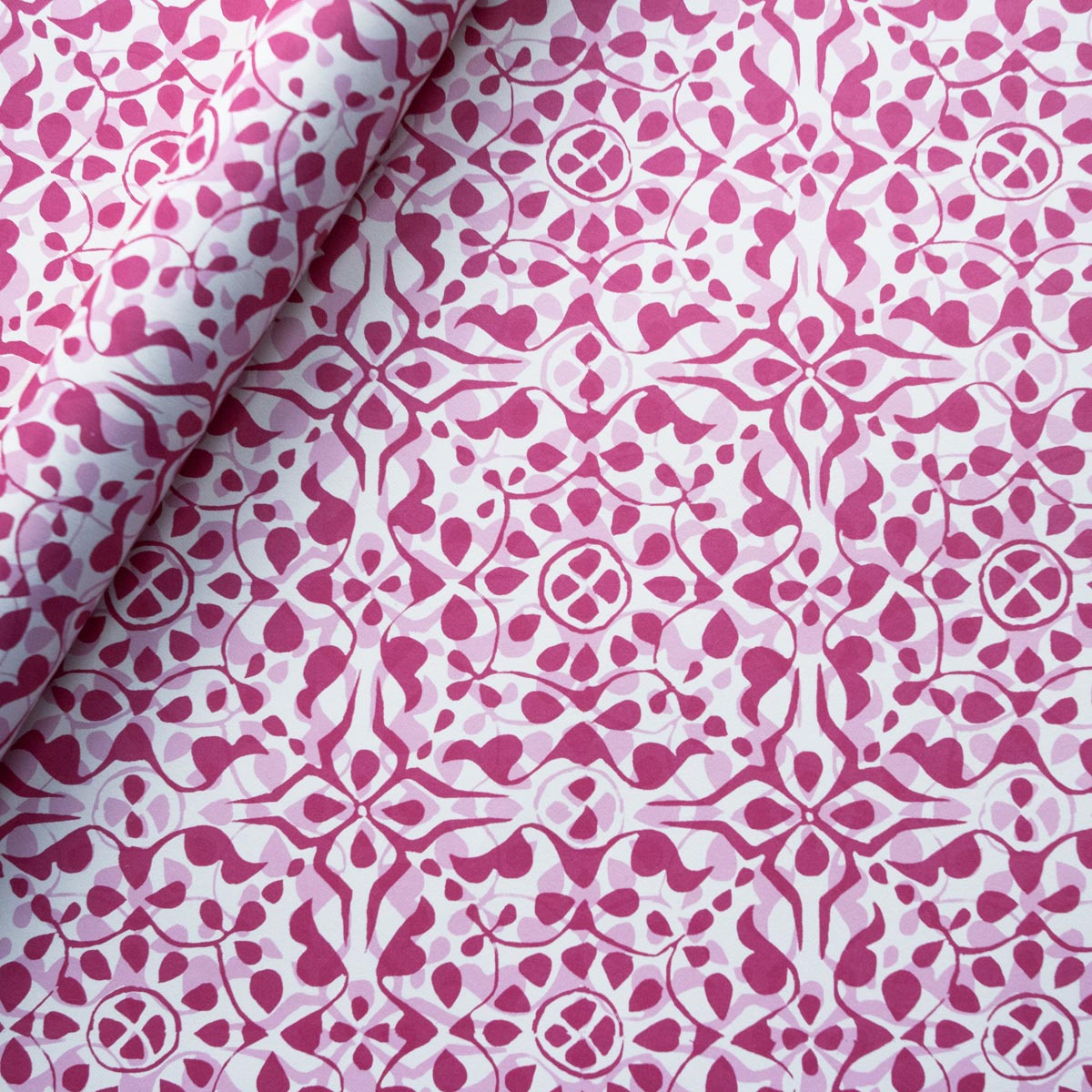 Shop Cambridge Imprint Dappled wrapping paper in the Eton Mess colourway. Artistic luxury gift wrap with a soft painterly design, printed in England.