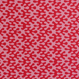 Shop Cambridge Imprint Kelp wrapping paper in Raspberry Ripple. Contemporary luxury gift wrap with an artistic optical stripe design, printed in England.