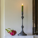 Elongated antique black metal candlestick with an intricate diamond base. A timeless, elegant accent that suits both classic and modern interiors.
