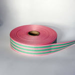 Candy pink and grass green multistripe cotton ribbon, 35mm wide, for colourful gift wrapping, statement bows and creative crafts.