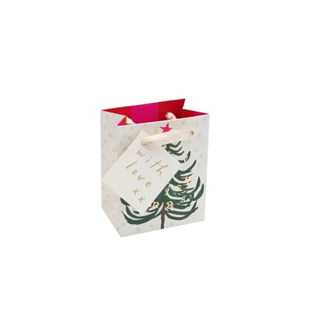 Caroline Gardner petite Christmas gift bag with gold Merry Christmas bunting lettering and a Christmas tree illustration, measuring 13.5 × 11 × 7cm.