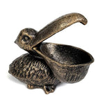 Decorative cast iron pelican trinket bowl for jewellery, keys and treasures. A vintage-inspired home accessory full of charm and character.