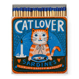 Luxury Cat Lover matchbox featuring a ginger tabby cat seated at a table with a sardine and vintage-style typography.