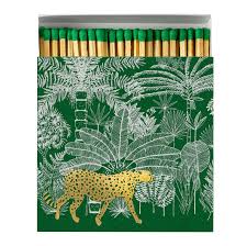 Luxury Cheetah matchbox featuring a gold foil cheetah walking through a green jungle-inspired design and containing 125 matches.