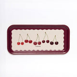 Handcrafted Cherries Birchwood Tray featuring vintage cherry botanical illustrations and an antique bow design on FSC-certified Swedish birchwood.