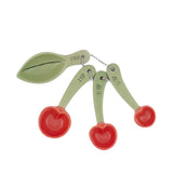 Cherry Measuring Spoons set featuring a bright cherry print, a playful kitchen accessory for cooking and baking.