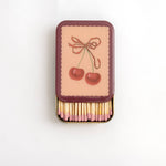 Cherry decorative match tin with 100 pink-tipped safety matches