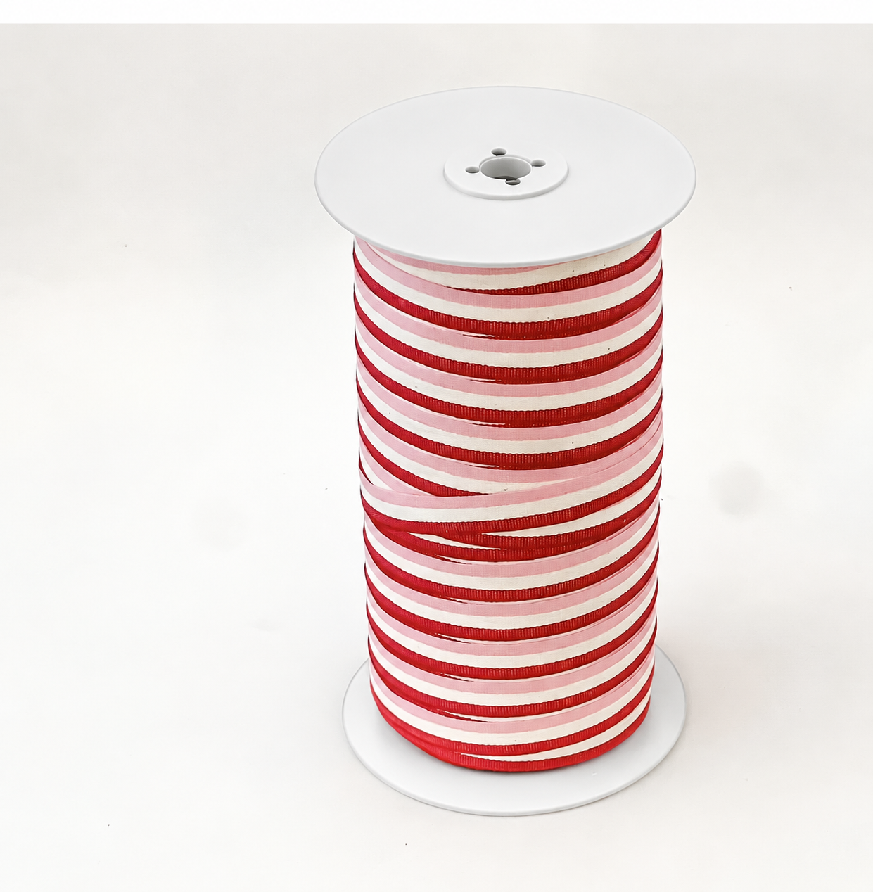 Christmas red tricolour cotton ribbon, 15mm wide, featuring a festive three-colour striped design for gift wrapping, bows and Christmas crafting.