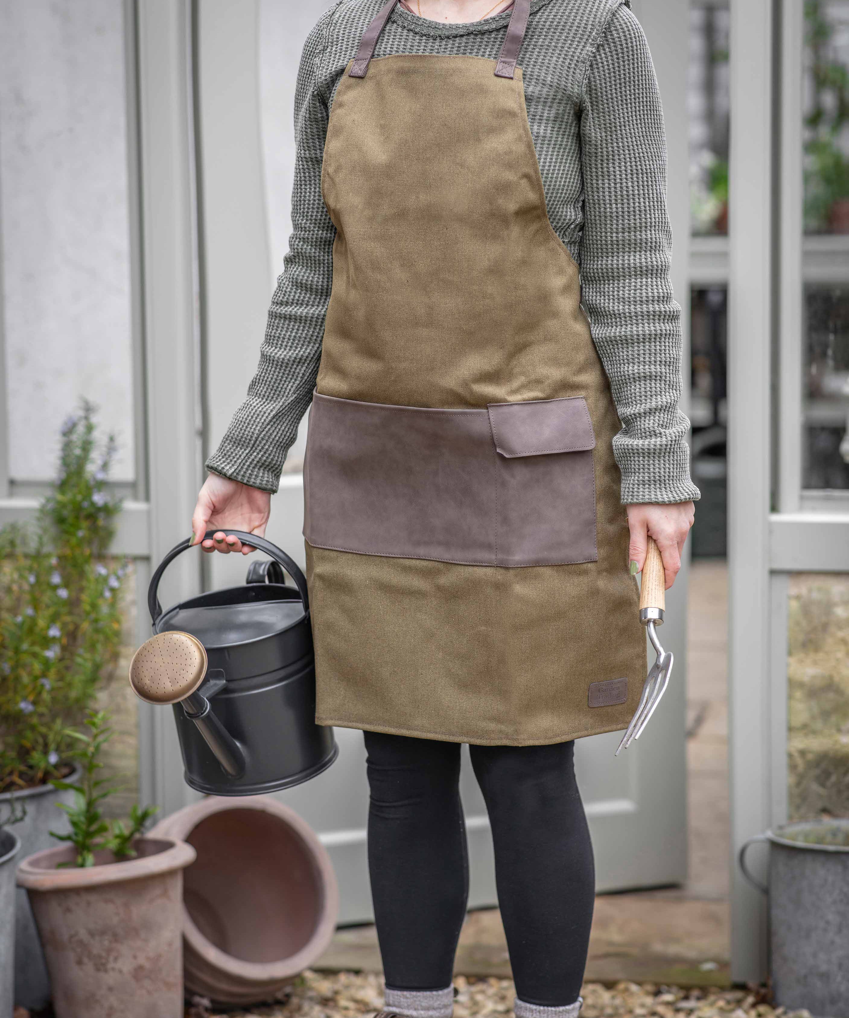 Classic Green Garden Apron in waterproof canvas with large front tool pocket.