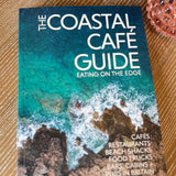 The Coastal Café Guide book featuring independent coastal cafés and restaurants around the UK