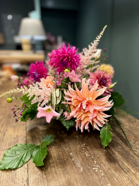 Luxury dahlia floristry workshop at Mad Lilies in Banstead Surrey creating a hand-tied bouquet with British seasonal flowers