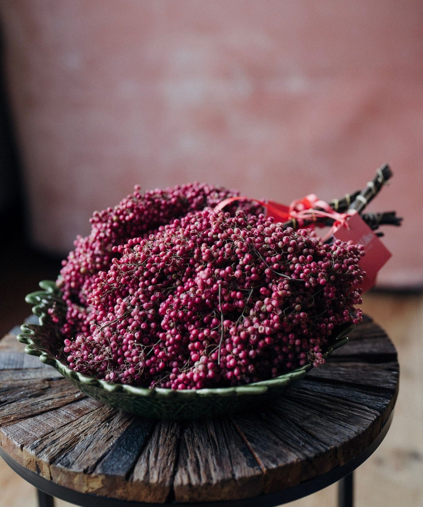 Natural dried pink pepperberry stems for Christmas wreath making and floral arrangements