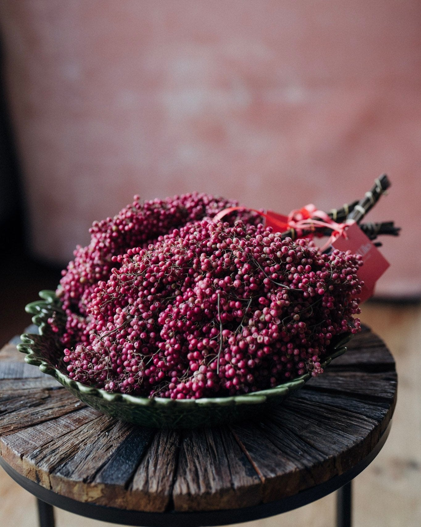 Natural dried pink pepperberry stems for Christmas wreath making and floral arrangements