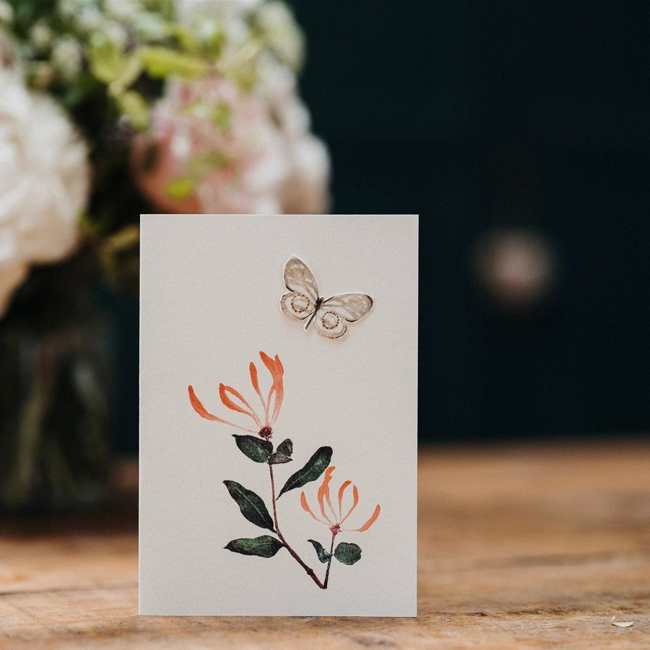 Beautiful handmade Honeysuckle card by Elena Deshmukh. Printed on luxury sustainable textured card with delicate botanical artisan detail.