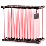 Ester & Erik Cherry Bloom 42cm tapered dinner candle in a soft glowing pale pink, traditionally hand-dipped and handcrafted in Denmark.