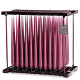 Ester & Erik Wild Heather 42cm tapered dinner candle in a muted mauve pink with soft lilac undertones, traditionally hand-dipped in Denmark.