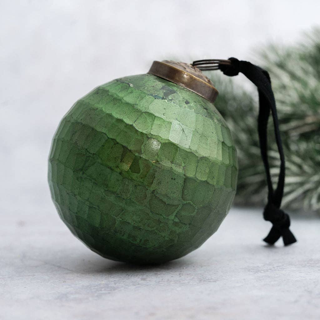 Evergreen green cut glass rustic Christmas bauble with hand-cut facets, ornate cap and black velvet ribbon