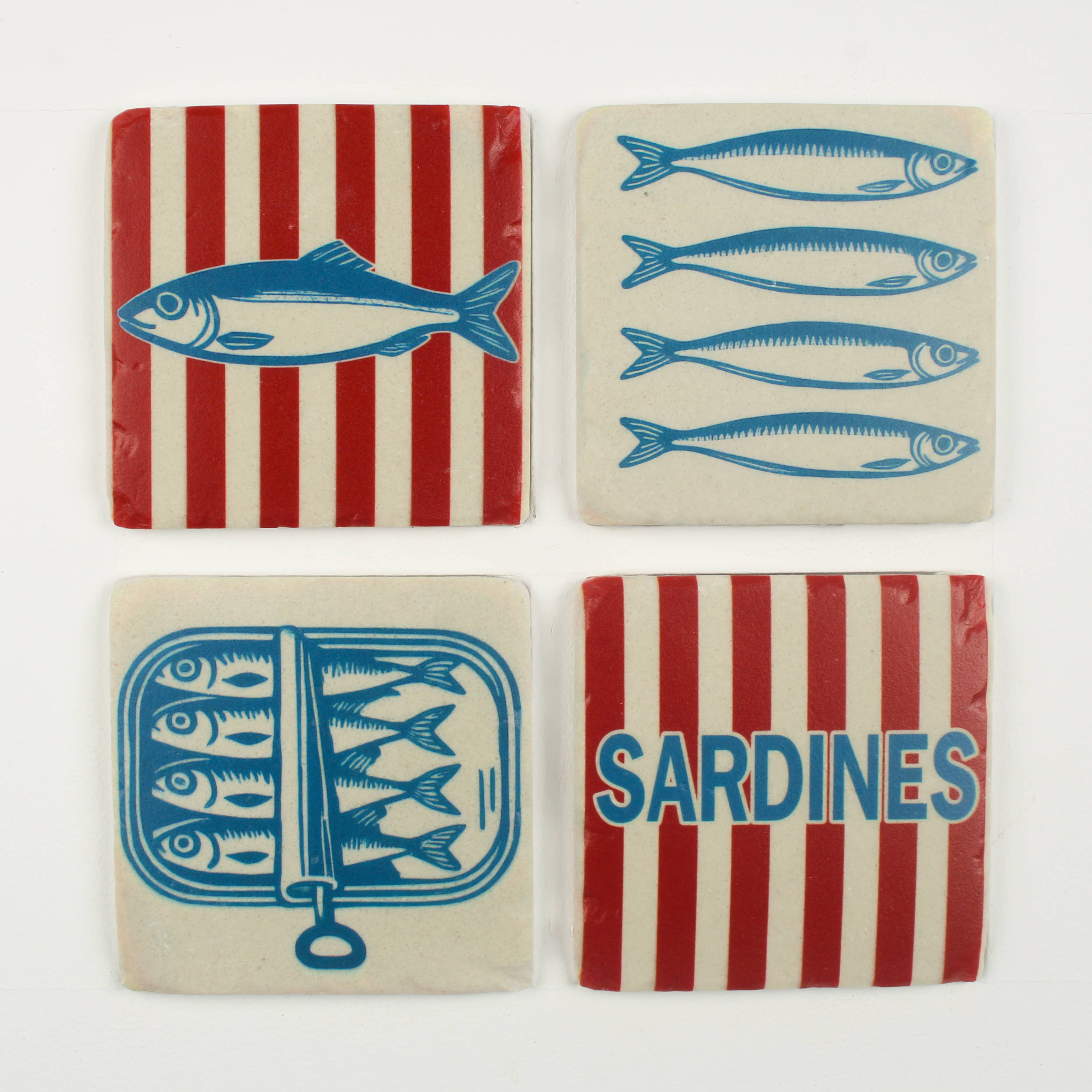Set of four retro sardine coasters with blue fish illustrations, red striped backgrounds and vintage coastal-inspired designs.