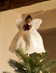 Warm white felt Christmas angel tree topper with berry coloured star