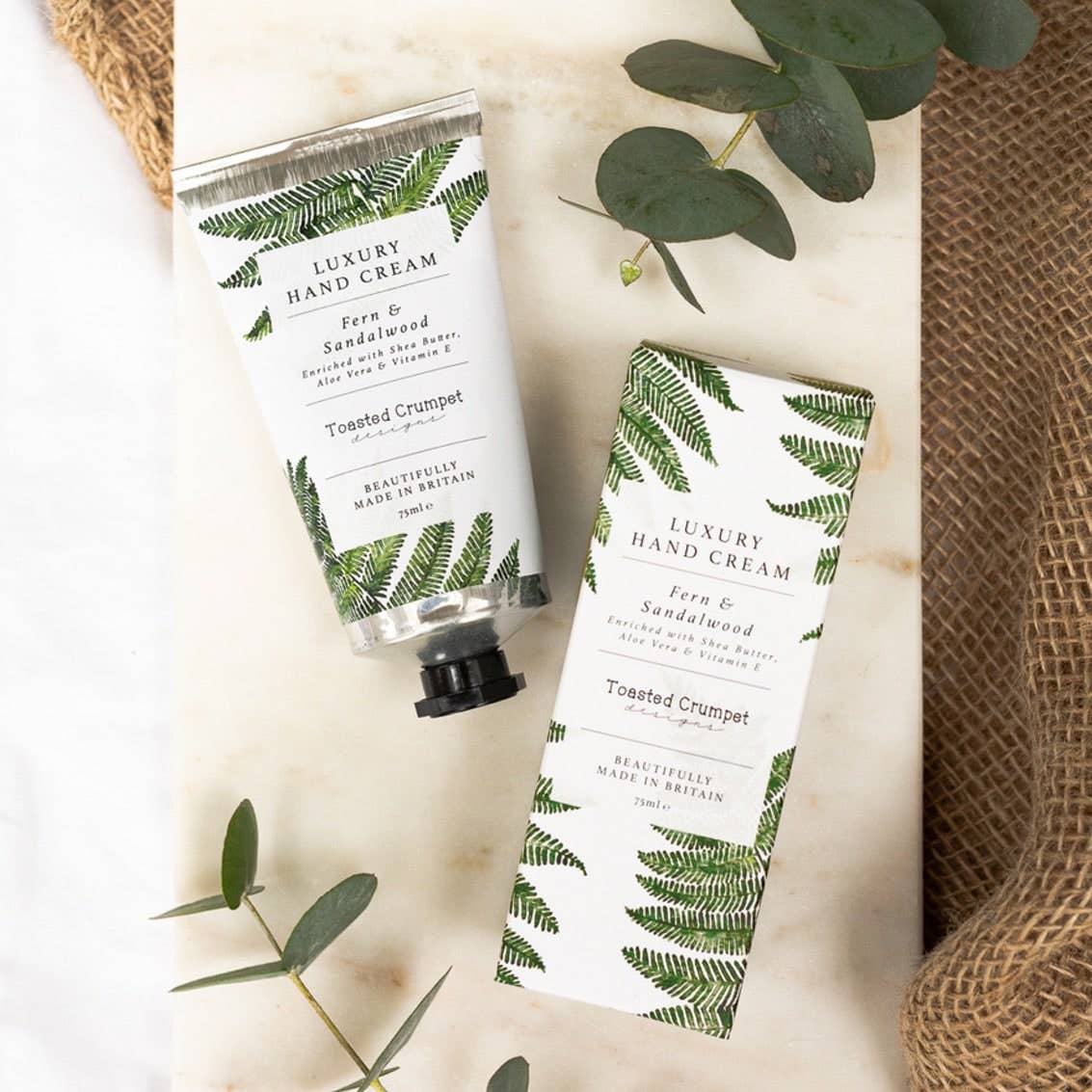 Indulge in the scent of fern and sandalwood with Toasted Crumpet’s luxury hand cream. Made in Britain, this rich 75ml cream nourishes and softens hands.