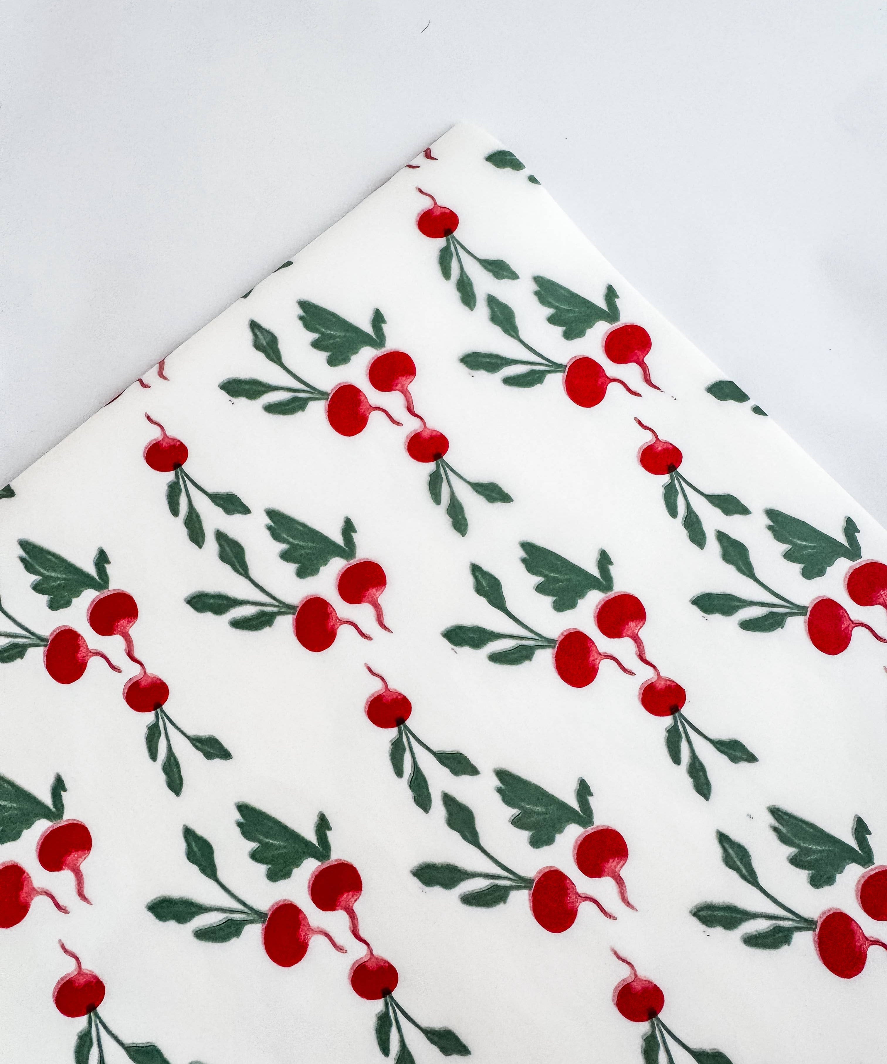 Discover our festive red and green botanical tissue paper. Perfect for Christmas gift wrapping, gift boxes and hampers. 62 × 86cm, sold by the sheet.