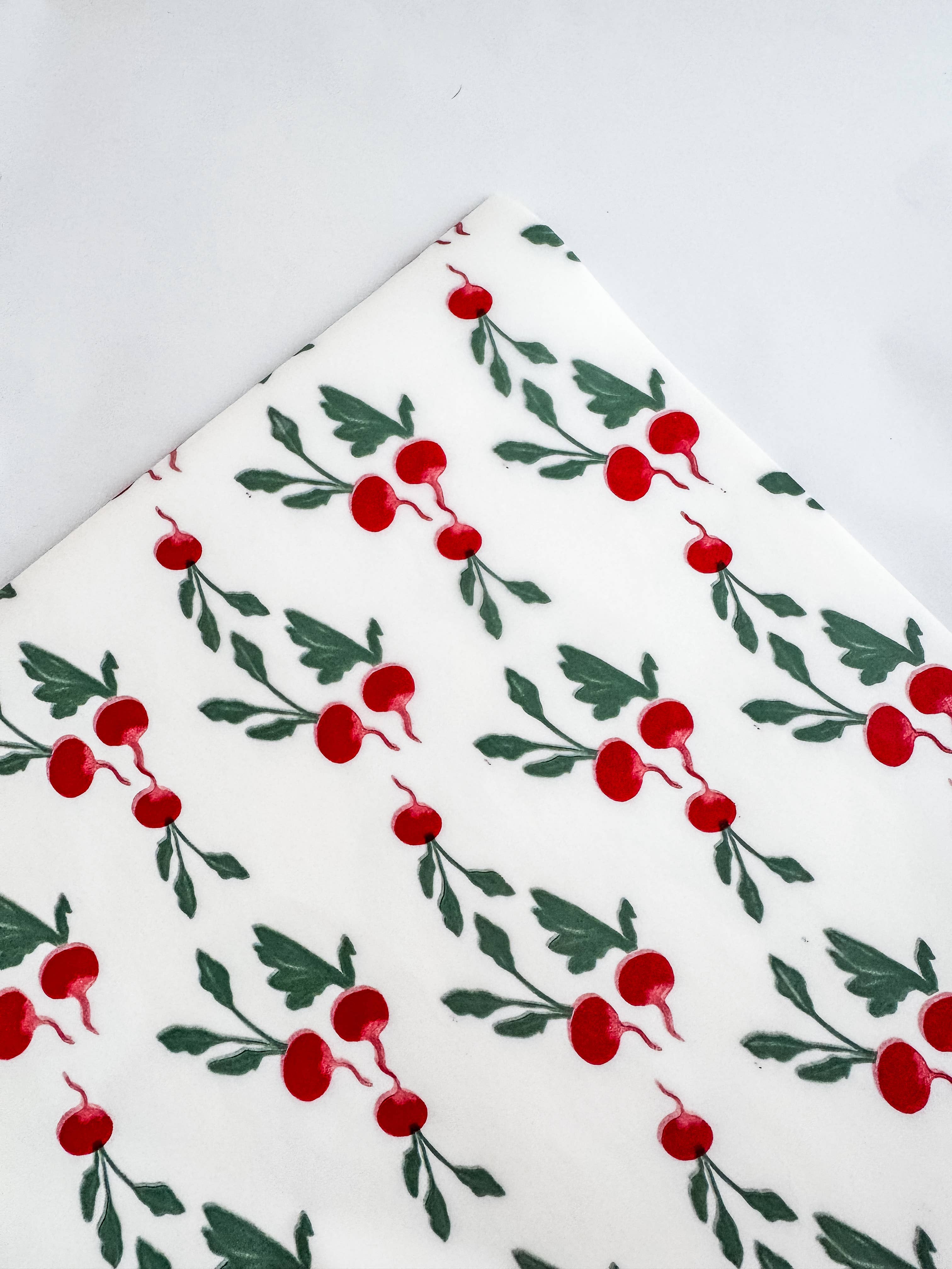Discover our festive red and green botanical tissue paper. Perfect for Christmas gift wrapping, gift boxes and hampers. 62 × 86cm, sold by the sheet.