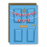 Birthday Boy greeting card featuring a blue front door with red bunting, printed on premium textured cardstock with a kraft envelope.