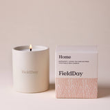 FieldDay Home scented candle in a reusable stoneware pot with bergamot, loose tea and nutmeg fragrance.