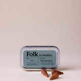 FieldDay Rain Folk Incense Cones in aluminium tin with drenched grass and petrichor fragrance.