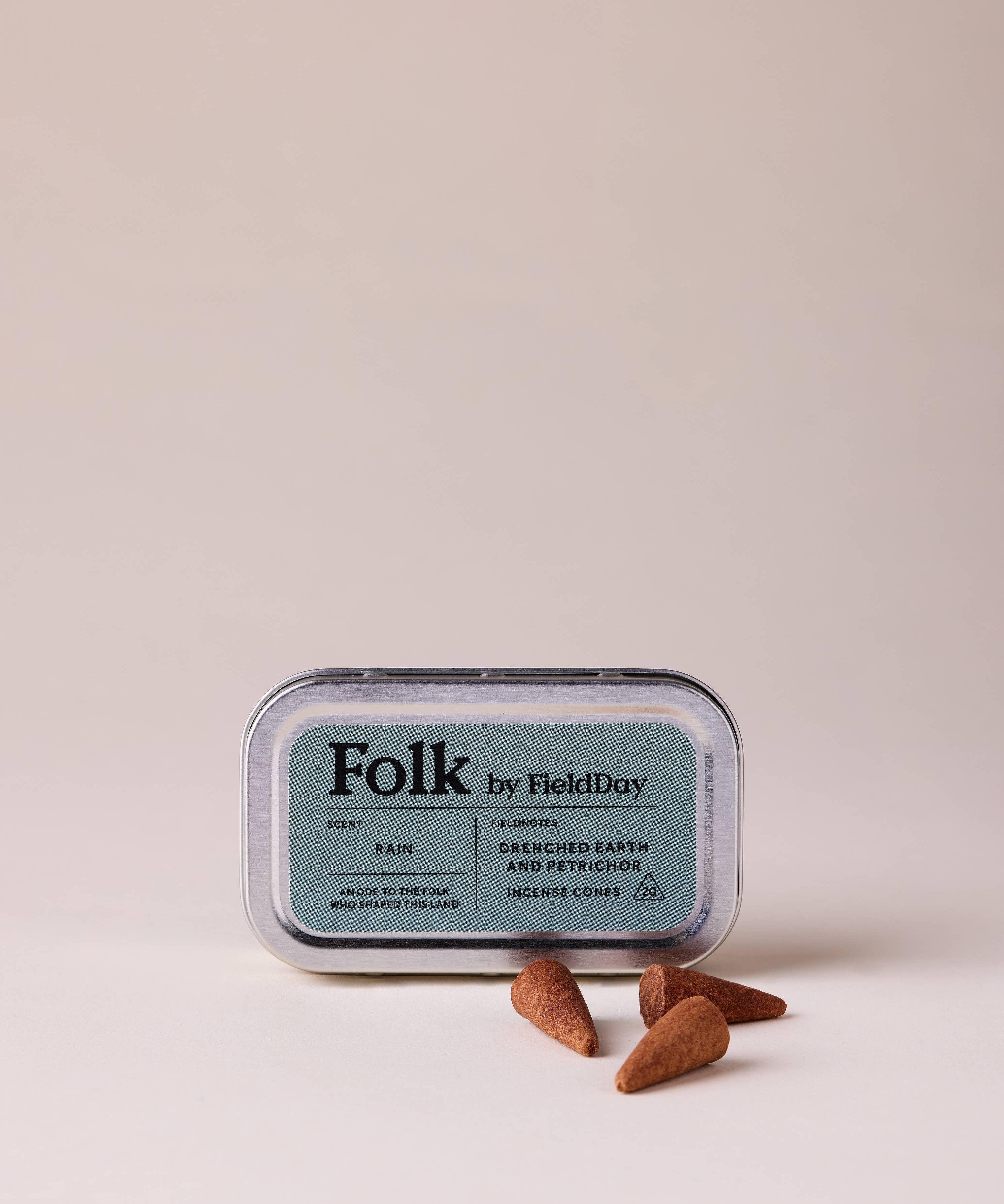 FieldDay Rain Folk Incense Cones in aluminium tin with drenched grass and petrichor fragrance.