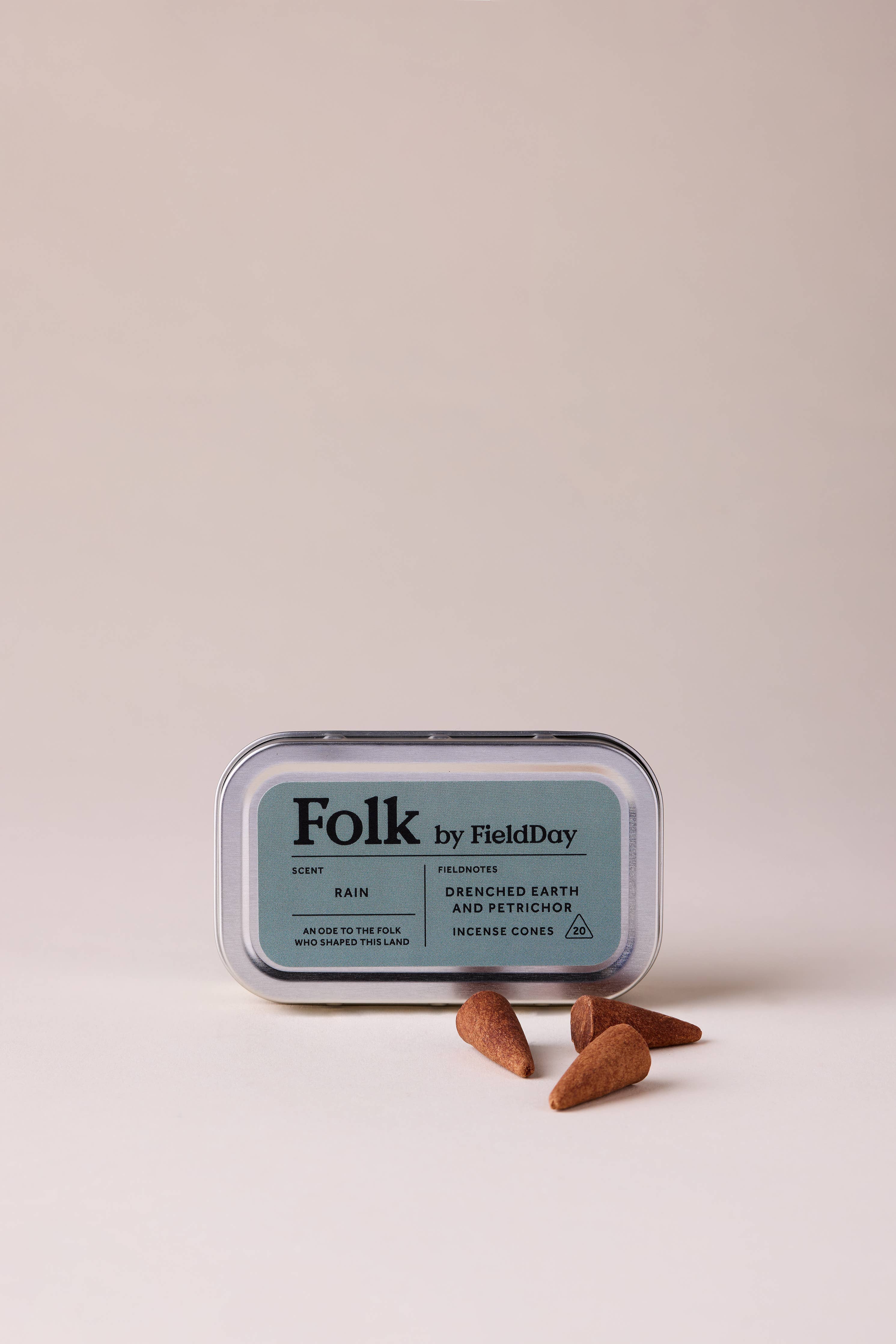 FieldDay Rain Folk Incense Cones in aluminium tin with drenched grass and petrichor fragrance.