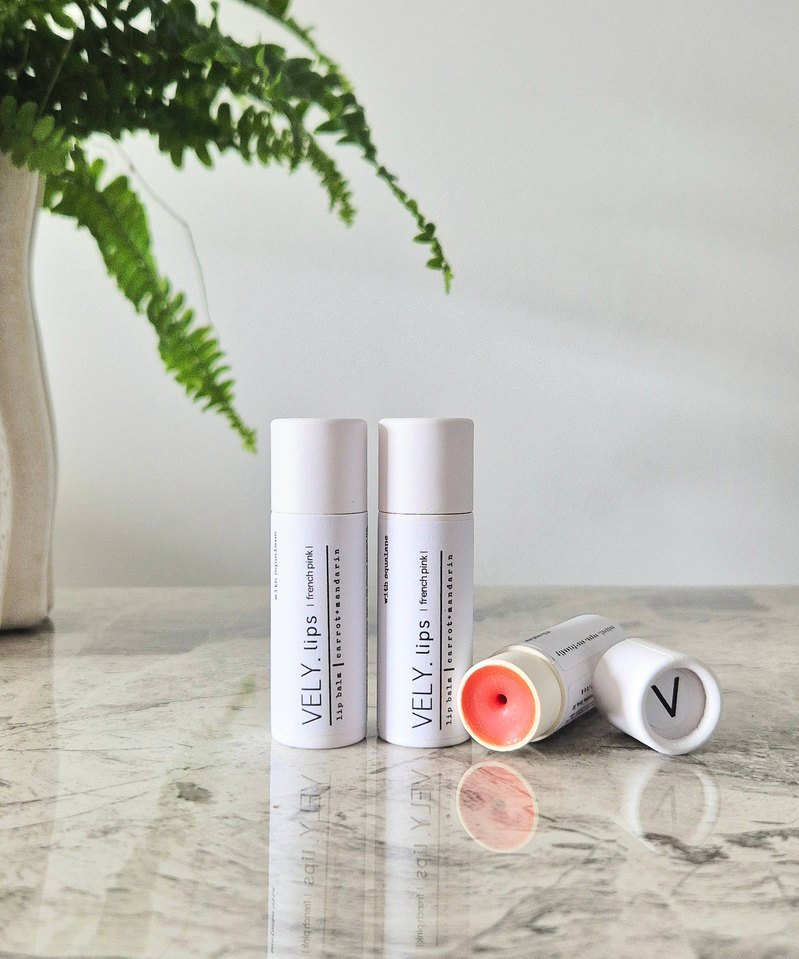 French Pink natural vegan tinted lip balm with olive squalane in plastic-free paper tube