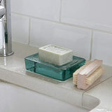 Wells blue-green soap dish made from 100% recycled glass with raised central ridges.
