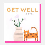 Get Well Soon greetings card featuring a cute illustrated cat beside a vase of flowers with gold foil embossed lettering and a pink envelope.