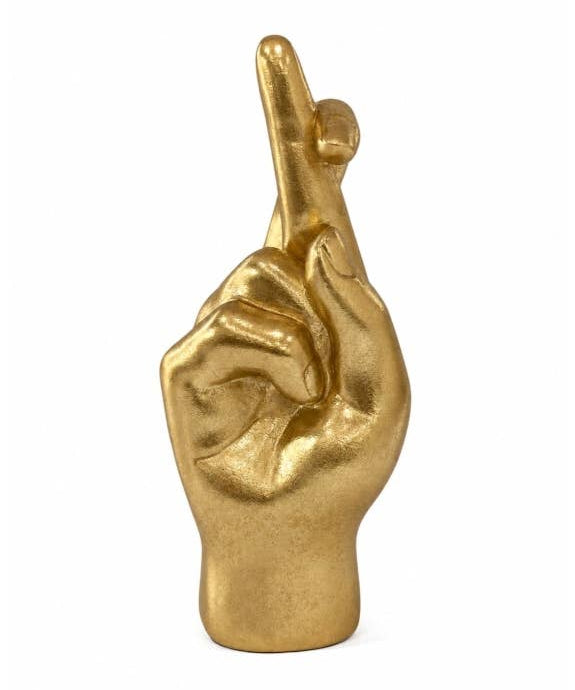 Gold decorative hand figure with fingers crossed, styled as a quirky good luck ornament for the home.