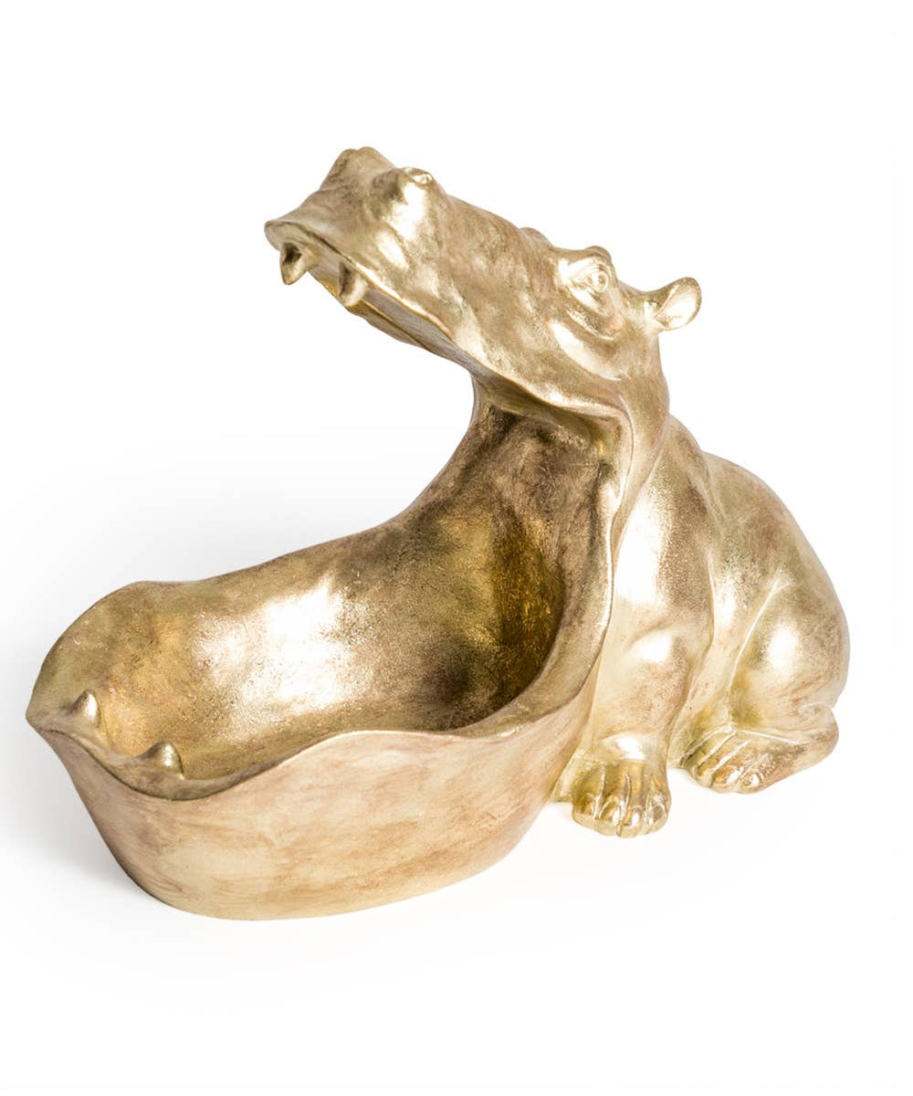 Gold hippo storage bowl for keys, jewellery and trinkets, decorative animal home accessory with metallic gold finish.