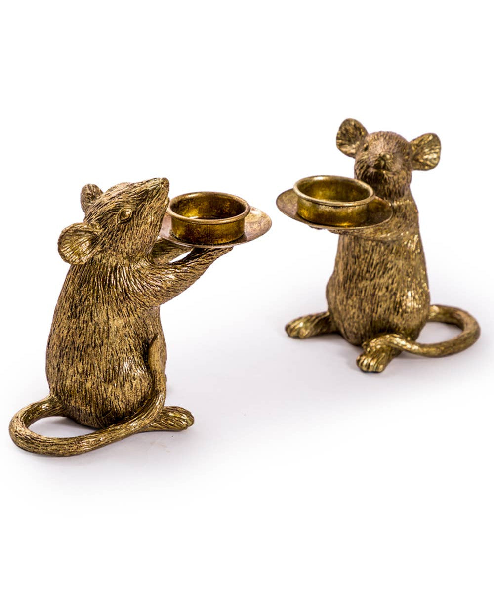 Gold mouse candle holder holding a taper candle, decorative animal candle holder for stylish home décor and dining table styling.