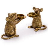 Gold mouse candle holder holding a taper candle, decorative animal candle holder for stylish home décor and dining table styling.