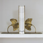 Golden Lotus Bookends with decorative floral design and aged gold finish.
