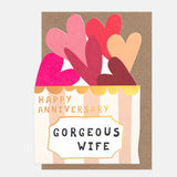 Happy Anniversary Gorgeous Wife card featuring a die-cut box filled with pink and red hearts and gold foil detailing.