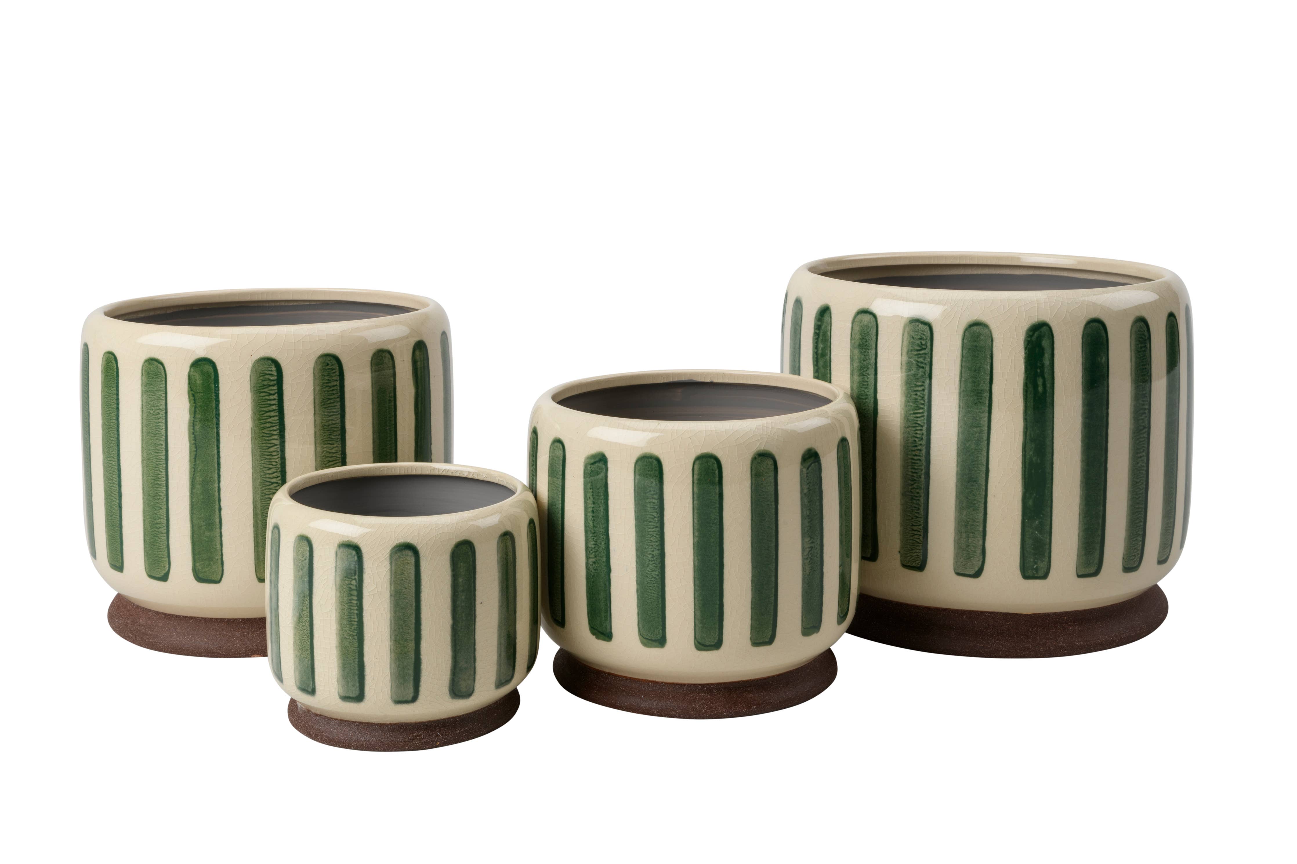 Green crackle glaze stoneware plant pot with subtle striped texture and integrated stand for styling indoor houseplants.