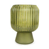 Cordless green ribbed glass LED table lamp with a matching matt base, creating warm ambient lighting for modern interiors.