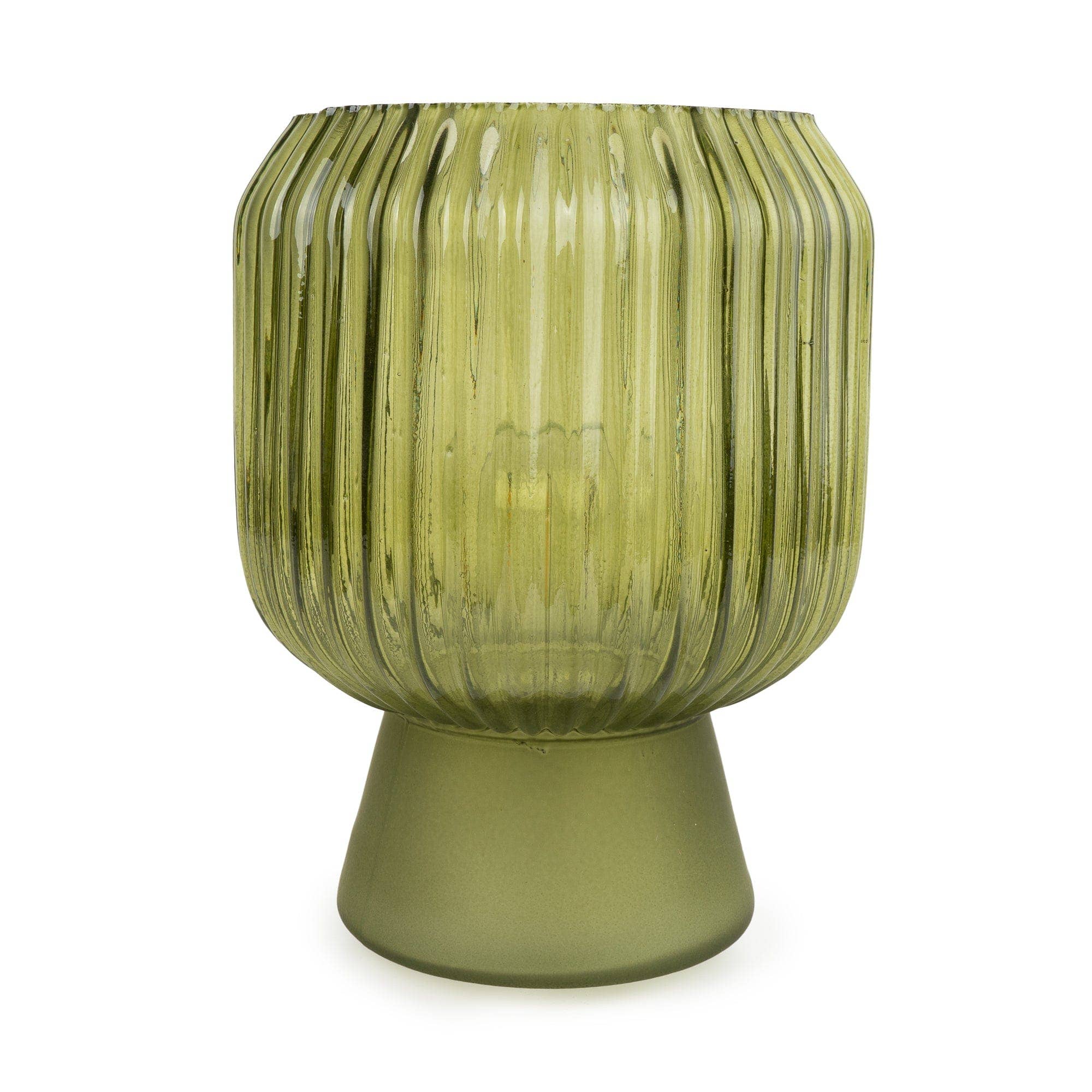Cordless green ribbed glass LED table lamp with a matching matt base, creating warm ambient lighting for modern interiors.