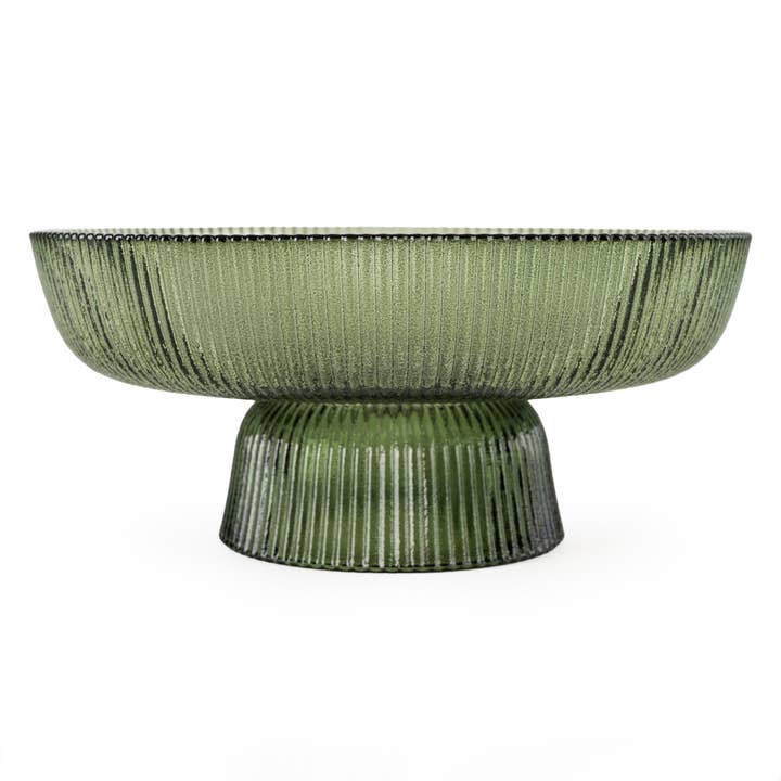 Shop green ridged glass pedestal bowl. A 20cm decorative serving dish perfect for fruit, desserts and elegant table styling.