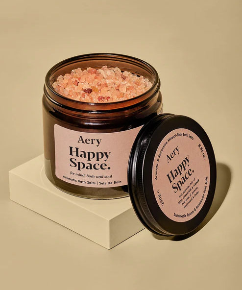 Relax and unwind with Happy Space Bath Salts. Mineral-rich Himalayan and Epsom salts with rose, geranium and amber to soothe body and mind.